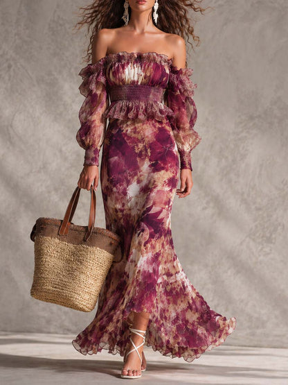 Vestido largo de gasa rosa con estampado floral y hombros descubiertos