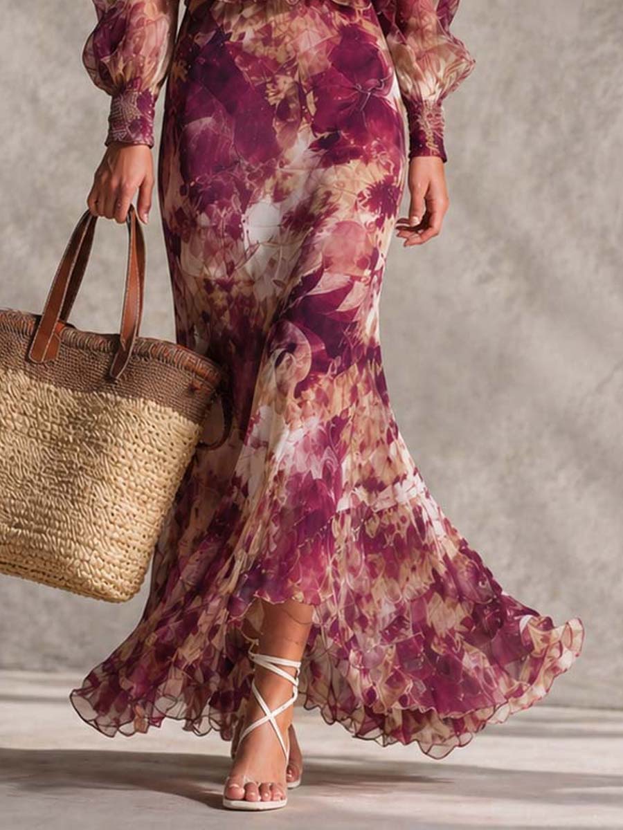 Vestido largo de gasa rosa con estampado floral y hombros descubiertos
