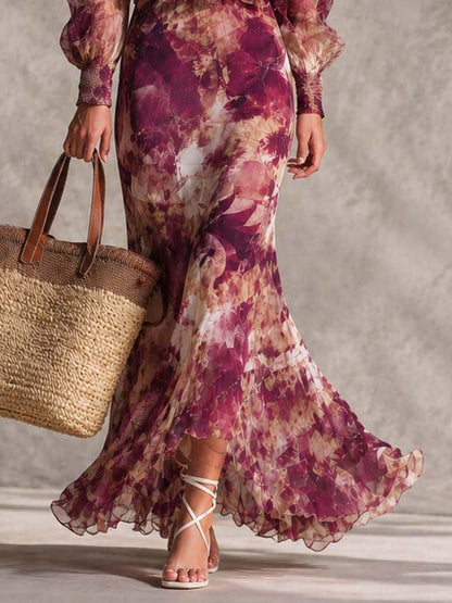 Vestido largo de gasa rosa con estampado floral y hombros descubiertos