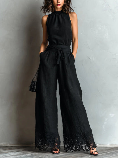 Ensemble gilet noir en coton synthétique à col montant et pantalon large à liseré dentelle et lien.