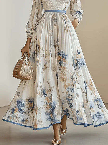 Vestido largo de manga larga abullonada con cuello en V y estampado floral, nuevo de primavera, de gasa plisada blanca.